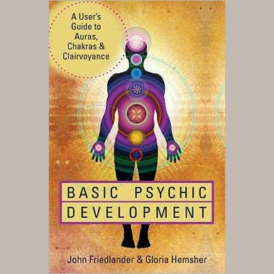 Basic Psychic Development book cover featuring an illustrated human figure with chakras.
