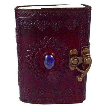 Lapis Sun leather blank journal with latch, featuring embossed sun design and Lapis stone.