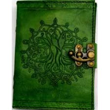 7" green Tree of Life leather journal with latch and embossed design.