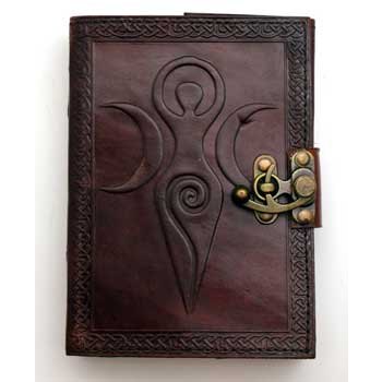 Maiden Mother Moon leather blank book with latch, embossed design, and cross-stitched spine.