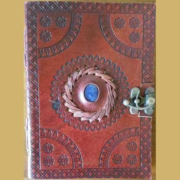 Eye embossed leather journal with latch and stone, 5" x 7".