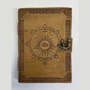 7" Moon Phase Embossed leather journal with latch closure and detailed design.