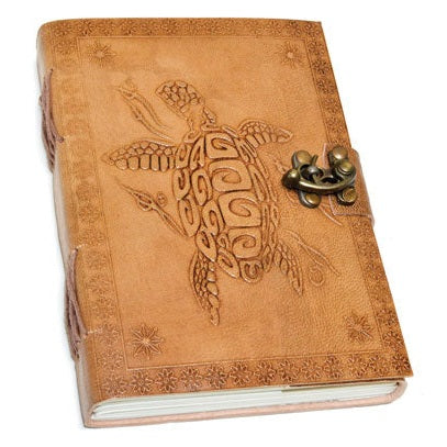 7" turtle embossed leather journal with metal latch closure, featuring a detailed turtle design on tan leather.