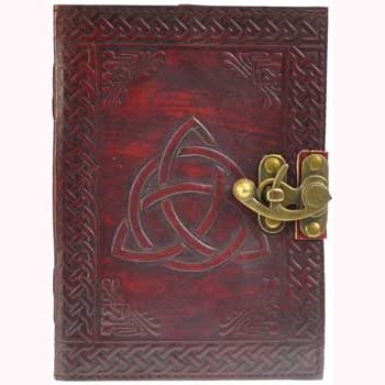 Triquetra leather blank book with embossed design and latch closure.