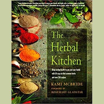 Herbal Kitchen book cover featuring herbs and spices illustration.