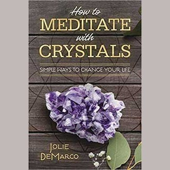 How to Meditate with Crystals book by Jolie DeMarco featuring amethyst crystal on cover.