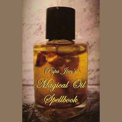 Bottle of Papa Jim's Magical Oil Spellbook with herbs inside for spiritual rituals and energy work