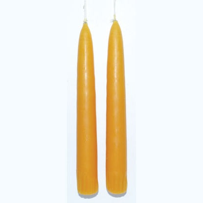 Pair of 7-inch spice-colored taper candles still joined at the wick for ritual and meditation use.