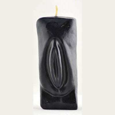 Black female genital candle shaped for spiritual and sexual energy work