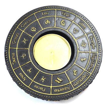 Astrological tealight holder with gold zodiac signs for spiritual protection and meditation
