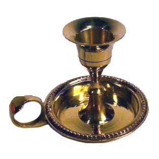 Brass chamberstick taper candle holder with finger loop and classic design.