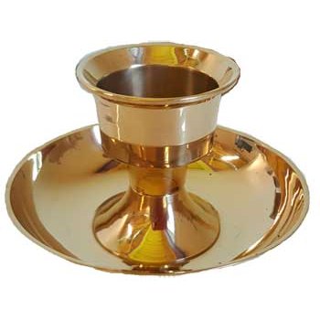 Brass pillar candle holder with 5-inch base designed for tapers and small pillar candles