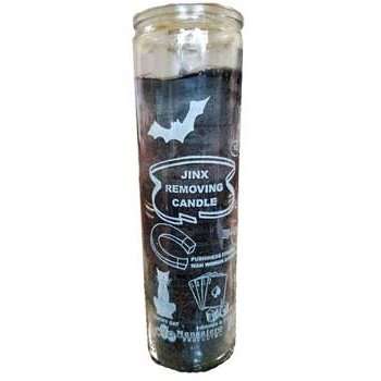 Jinx Removing 7-day jar candle with grey and purple layers in clear glass jar with good fortune symbols