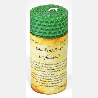 Green 4-inch Lughnasadh altar beeswax pillar candle with textured honeycomb pattern and ritual label