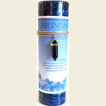 Abundance pillar candle with Blue Sandstone pendant for intention setting and spiritual rituals.