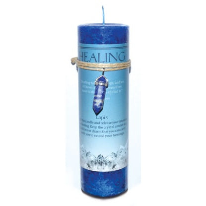Healing pillar candle with Lapis pendant for healing intentions.