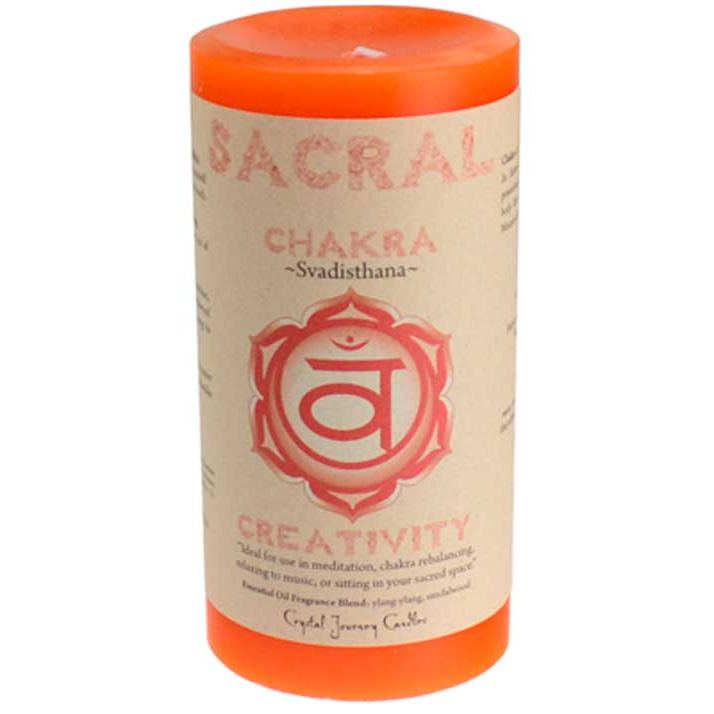 Orange Sacral Chakra pillar candle 3 inch with removable paper label and chakra symbol