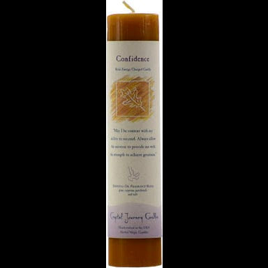 Confidence Reiki Charged pillar candle for energy work and rituals, handcrafted and scented with essential oils.