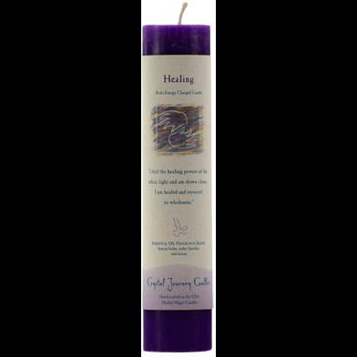 Healing Reiki Charged pillar candle for spiritual empowerment and rituals.