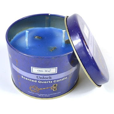 Destrancaders Unlock quartz tin candle with turmeric scent and crystal chips for protection and spiritual energy