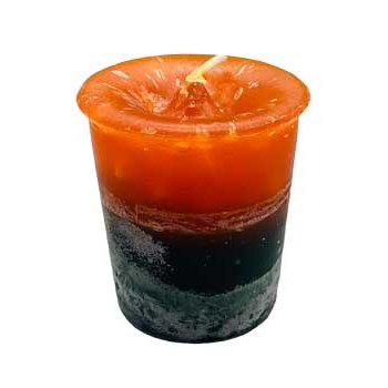 Green Forest & Cedar votive candle with earthy scent.