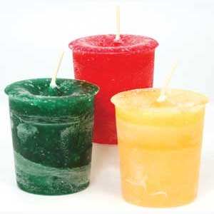 Dark green Peace Herbal votive candle infused with Reiki energy for healing and serenity.
