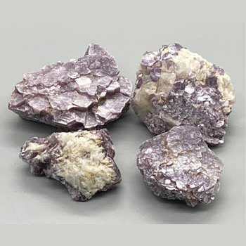 Flat of Lepidolite rough cut specimens weighing approximately 3 pounds with natural purple and white hues from Brazil