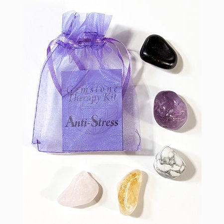 Anti-Stress gemstone therapy kit with Amazonite, Howlite, Black Tourmaline, Citrine, and Rose Quartz in a purple organza bag