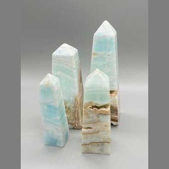 1 kg 3-5" 4-4/pk Caribbean Calcite obelisk
