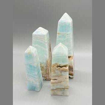 1 kg 3-5" 4-4/pk Caribbean Calcite obelisk