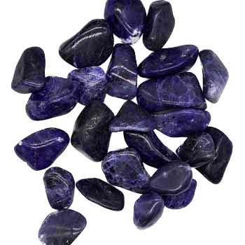 Deep blue Sodalite tumbled stones with lightning-like veins for emotional clarity and spiritual protection, ideal for Empaths and meditation.