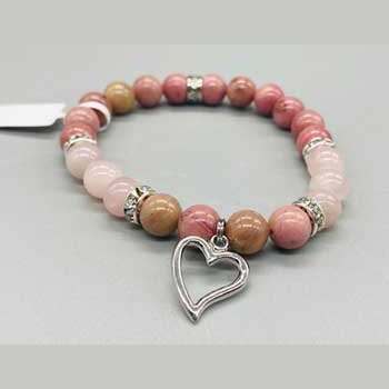 8mm Rhodonite and Rose Quartz beaded bracelet with silver spacers and heart charm on a white background