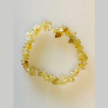 Citrine chip bracelet with yellow heat-treated stones on elastic string for energy and manifestation.