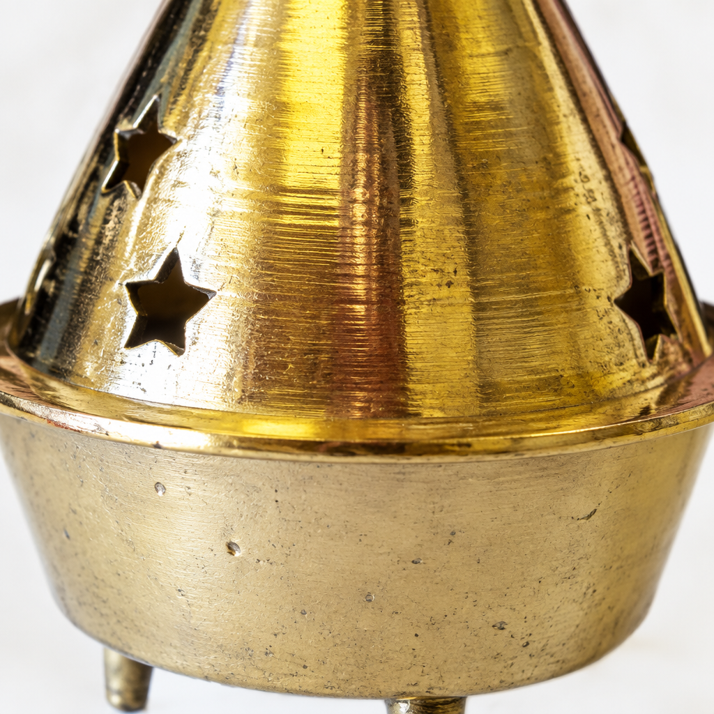 Detail view: the pierced brass body up close