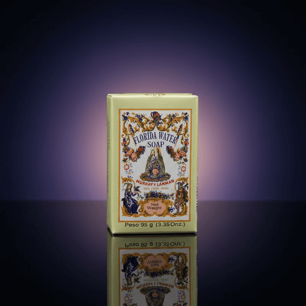 A close-up shot of the Florida Water Soap 95 grams placed on a reflective black surface in a sophisticated professional studio. The scene is lit with softbox lighting to create a smooth, even glow that highlights the soap's textured, slightly glossy surfac