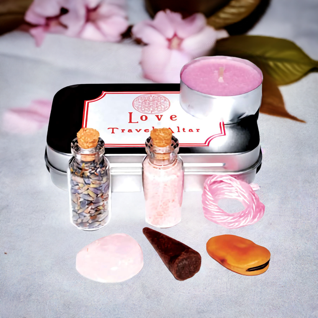 Love Travel Altar Kit with pink candle, crystals, herb blend, incense cone, pink cord, and mojo bean.