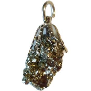 7 Metals amulet made from lead, tin, iron, gold, copper, mercury, and silver on pyrite base.