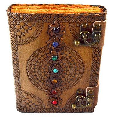 7 Chakra Leather Journal with aged leather cover, chakra stones, and latch for empath protection and spiritual balance