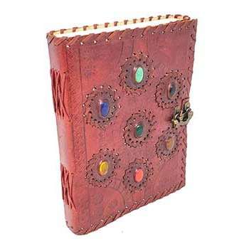 6" x 8" journal with 7 Chakra stones in embossed leather cover and latch.