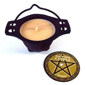 Patchouli candle in cast iron cauldron with decorative lid.