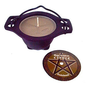 Sandalwood candle in cast iron cauldron with decorative lid.