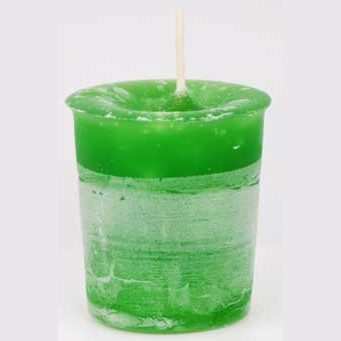 Green abundance herbal votive candle with Reiki energy for spiritual rituals and meditation