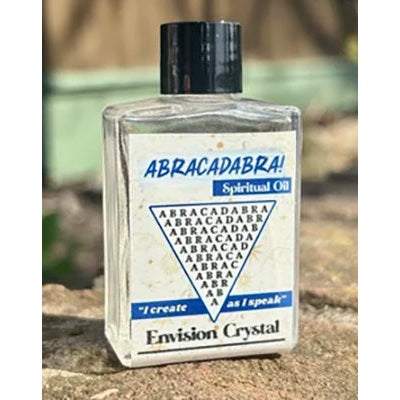 Abracadabra Anointing Oil bottle for spiritual rituals and manifestation with herbs and calming essence