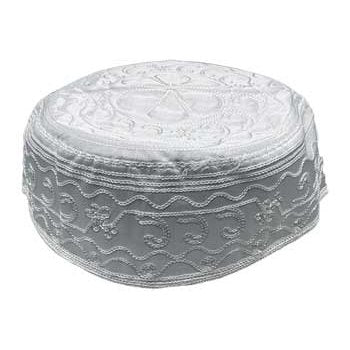 White Obatala santeria hat with intricate embroidery, symbolizing purity and peace.