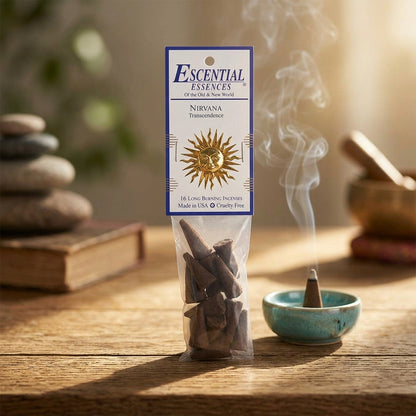 Nirvana Incense Cone on rustic ceramic dish with warm lighting, capturing fine textures and a sense of ritual purity in a meditative setting.