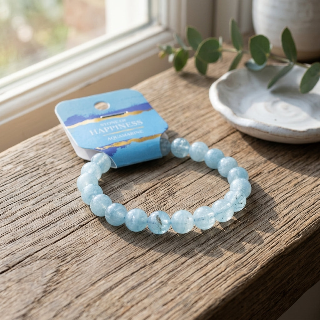 Still life of a tiny aquamarine bracelet resting on a rustic wooden table with natural daylight, showcasing micro-details and tranquil colors.
