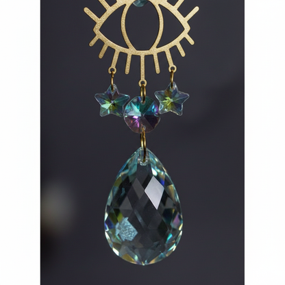 Evil Eye Crescent Sun Catcher, 16 Inches, shown in use