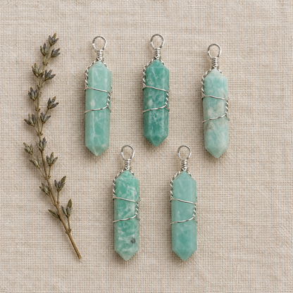 Five amazonite points on linen