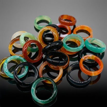 You will be generating high-quality product photos for an online stores product page. The product images should closely match the original products.
      Here is the prompt (IMPORTANT!): """A highly detailed, photorealistic studio shot of the Agate Banded
