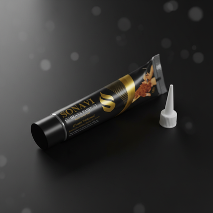 A close-up shot of the Sonavi Henna Paste jar, illuminated with softbox studio lighting that highlights its textured, earthy exterior and intricate design on the label. The camera is positioned at a slight angle with a macro lens, focusing sharply on the p